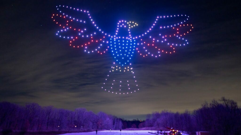 Aigle multicolore en drones dans un ciel d'hiver